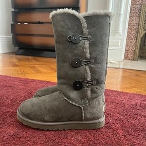 Pre-loved grey tall Bailey UGG boots with buttons. US womens 9